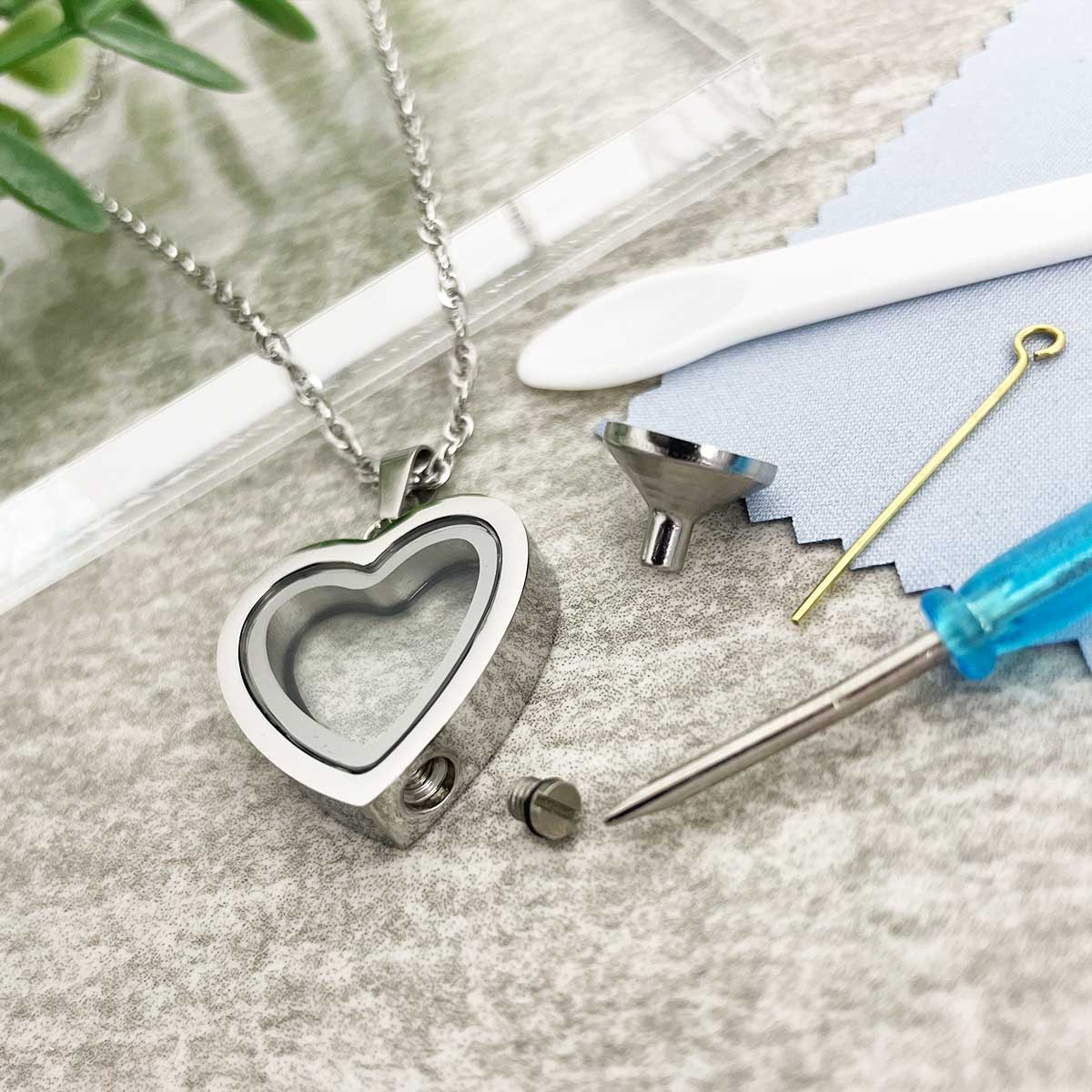 THE HEART OF GOLD LOCKET NECKLACE