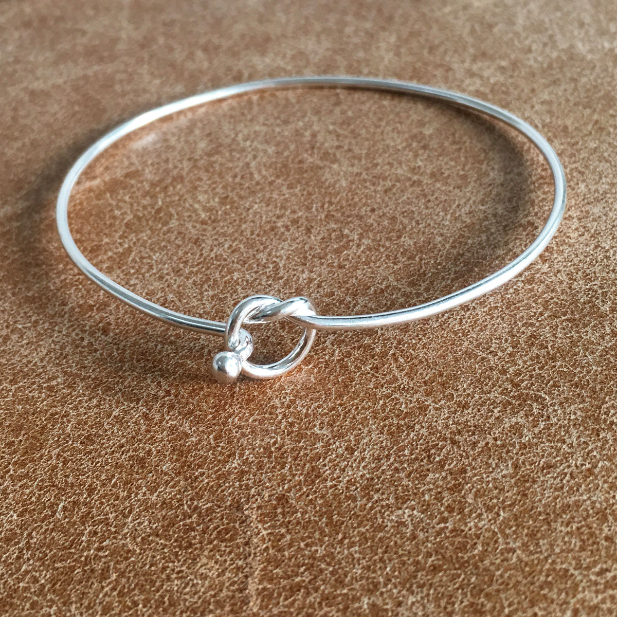 Friendship knot bracelet silver on sale